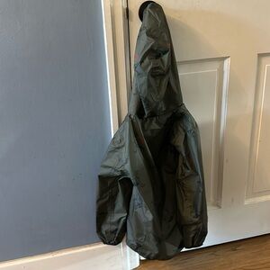 Boys’ Joules green dinosaur waterproof raincoat with hood